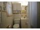 Traditional bathroom featuring a toilet, sink, and under sink cabinet at 1444 Eastfield Dr, Clearwater, FL 33764