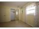 Bright bedroom featuring a mirrored closet door and natural light at 1444 Eastfield Dr, Clearwater, FL 33764
