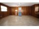 Relaxing bonus room with neutral tile flooring, ceiling fan and ample space for furniture at 1444 Eastfield Dr, Clearwater, FL 33764
