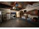 Spacious garage equipped with laundry appliances and cabinetry for storage at 1444 Eastfield Dr, Clearwater, FL 33764