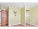 Inviting bedroom with a decorative wall art, mirrored closet doors, and ample natural light at 1514 Florida Ave, Palm Harbor, FL 34683