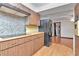This kitchen showcases butcher block countertops and wooden cabinets at 1514 Florida Ave, Palm Harbor, FL 34683