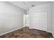 Bedroom featuring a closet and a doorway to another room at 15711 Starling Dale Ln, Lithia, FL 33547
