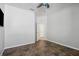 This bedroom features tile floors and a doorway to another room at 15711 Starling Dale Ln, Lithia, FL 33547
