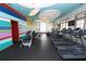 State-of-the-art gym with modern exercise equipment, including treadmills and stationary bikes at 15711 Starling Dale Ln, Lithia, FL 33547