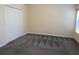 Bedroom showcasing a closet and window for natural lighting at 16618 Kingletside Ct, Lithia, FL 33547