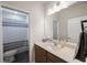 Bathroom featuring a vanity with a sink and a toilet with a shower at 1897 Trailside Dr, Palm Harbor, FL 34683
