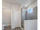 This bathroom features a tiled shower, toilet, and an exhaust fan at 1897 Trailside Dr, Palm Harbor, FL 34683