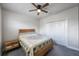 Bright bedroom with carpet and white closet doors at 1897 Trailside Dr, Palm Harbor, FL 34683