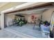Open garage with golf cart, workbench, and ample space at 1897 Trailside Dr, Palm Harbor, FL 34683