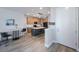 Bright, modern kitchen with an island, stainless appliances, and stylish pendant lighting at 1897 Trailside Dr, Palm Harbor, FL 34683