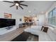 Open living room connected to the kitchen at 1897 Trailside Dr, Palm Harbor, FL 34683