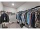 Spacious walk-in closet providing ample storage space for clothes, shoes, and accessories at 1897 Trailside Dr, Palm Harbor, FL 34683