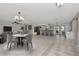 Open concept kitchen and dining area with seamless flow and modern finishes at 1907 Sandpiper Dr, Clearwater, FL 33764