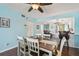 Comfortable dining area featuring updated fixtures and open access to the kitchen at 19925 Gulf Blvd # 105, Indian Shores, FL 33785