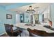Kitchen featuring a breakfast bar, stainless steel appliances, and open layout at 19925 Gulf Blvd # 105, Indian Shores, FL 33785