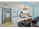 Kitchen with quartz countertops and a bar area with seating at 19925 Gulf Blvd # 105, Indian Shores, FL 33785