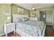 Charming main bedroom with matching white dressers and seaside decor at 19925 Gulf Blvd # 105, Indian Shores, FL 33785