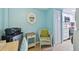 Cozy office space adjacent to the kitchen with coastal-themed decorations at 19925 Gulf Blvd # 105, Indian Shores, FL 33785