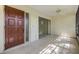 Inviting sunroom with tiled floor and sliding glass doors to let the outside in at 2150 Shelly Dr # D, Palm Harbor, FL 34684