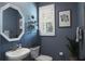 Charming bathroom with modern fixtures, stylish mirror, plantation shutters and a fresh aesthetic at 21874 Crest Meadow Dr, Land O Lakes, FL 34637