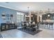Open-concept dining room seamlessly transitions to the kitchen at 21874 Crest Meadow Dr, Land O Lakes, FL 34637
