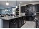 Contemporary kitchen featuring stainless steel appliances, granite countertops, and plenty of counter space at 21874 Crest Meadow Dr, Land O Lakes, FL 34637