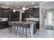 Modern kitchen featuring stainless steel appliances, an island with bar seating, and lots of cabinet space at 21874 Crest Meadow Dr, Land O Lakes, FL 34637