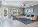 Living room featuring a comfortable-looking sofa at 21874 Crest Meadow Dr, Land O Lakes, FL 34637