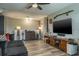 Living room with decorative lamps and wood-look flooring at 21874 Crest Meadow Dr, Land O Lakes, FL 34637
