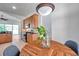 Well-designed kitchen with stainless steel appliances and adjacent breakfast nook at 2407 Kensington Greens Dr, Sun City Center, FL 33573