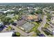 Aerial view of community amenities including a pool, parking, and tennis courts at 2416 World Parkway Blvd # 26, Clearwater, FL 33763