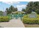 A community dog park area features separate gated areas for small and large dogs, with covered seating at 2416 World Parkway Blvd # 26, Clearwater, FL 33763