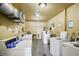 This is a shared laundry room with multiple washers and dryers at 2416 World Parkway Blvd # 26, Clearwater, FL 33763