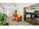 The living room opens to the kitchen, creating an open concept living space at 2416 World Parkway Blvd # 26, Clearwater, FL 33763