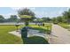 Community picnic area featuring picnic tables, grills, and green space, perfect for outdoor gatherings at 2416 World Parkway Blvd # 26, Clearwater, FL 33763
