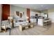 Inviting living room area that flows into the kitchen, complete with modern furnishings and stylish décor at 263 Royal Spoonbill Dr, Ruskin, FL 33570