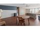 Expansive living and dining area with hardwood floors and ample space for entertaining at 26438 Glenwood Dr, Wesley Chapel, FL 33544