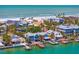 Coastal homes with docks on a canal leading to ocean at 2903 Pass A Grille Way, St Pete Beach, FL 33706