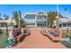 The home has a dock with built-in benches, perfect for relaxing by the water at 2903 Pass A Grille Way, St Pete Beach, FL 33706