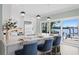 Gourmet kitchen featuring a large island, stainless steel appliances, and waterway view at 2903 Pass A Grille Way, St Pete Beach, FL 33706