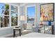 Serene main bedroom featuring a water view, natural light, and stylish decorations at 2903 Pass A Grille Way, St Pete Beach, FL 33706