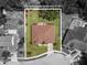 Aerial view of home with a large, fenced backyard with an outdoor living space at 3041 Colonial Ridge Dr, Brandon, FL 33511