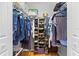 Spacious walk-in closet with ample shelving and hanging space for organized storage at 3041 Colonial Ridge Dr, Brandon, FL 33511