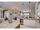 A kitchen features a granite island, stainless steel appliances and ample cabinet space at 3123 Whitehead Ln, Land O Lakes, FL 34638