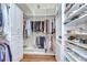 Custom walk-in closet with ample storage and custom shelving at 3123 Whitehead Ln, Land O Lakes, FL 34638