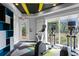 Bright fitness center featuring modern exercise equipment and natural light for a healthy lifestyle at 33487 Azalea Ridge Dr, Wesley Chapel, FL 33545