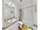 Well-lit bathroom features modern fixtures, a neutral color scheme, and practical design at 35552 Shade Fern Ln, Zephyrhills, FL 33541