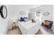 Cozy bedroom featuring a comfortable bed, stylish decor, and natural light at 35552 Shade Fern Ln, Zephyrhills, FL 33541
