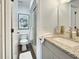 Modern bathroom with a glass-enclosed shower, sleek vanity, and contemporary fixtures at 366 47Th N Ave # 3, St Petersburg, FL 33703